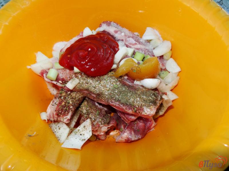 Фото приготовление рецепта: Ребра в томатно-медовом маринаде на решетке шаг №5