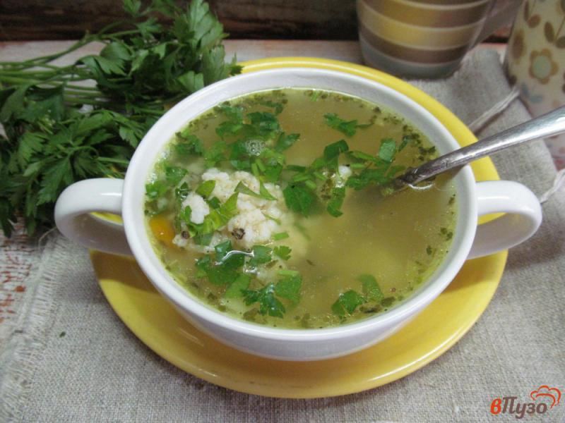 Фото приготовление рецепта: Куриный суп с пшеничной кашей шаг №7