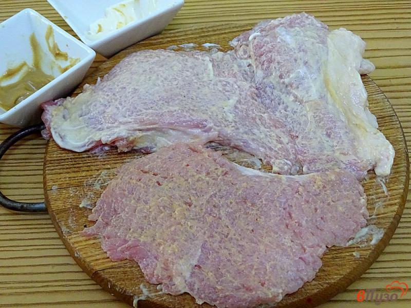 Фото приготовление рецепта: Свиные отбивные в пивном маринаде шаг №3