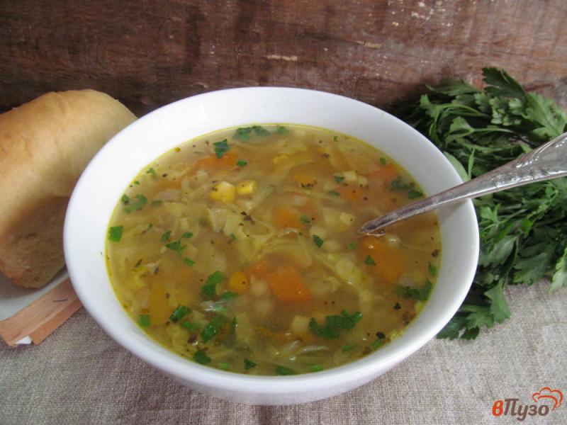 Фото приготовление рецепта: Капустный суп с кукурузой и крупой шаг №8