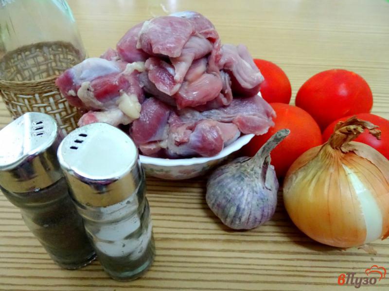 Фото приготовление рецепта: Куриные желудки с помидорами шаг №1