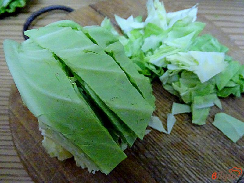 Фото приготовление рецепта: Гарнир из капусты, кабачка и шпината шаг №2