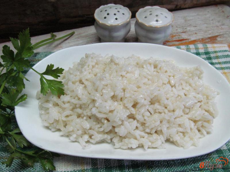 Фото приготовление рецепта: Рис рассыпчатый с чесноком шаг №5