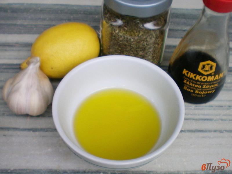 Фото приготовление рецепта: Рыба сарпа под чесночно-лимонным соусом шаг №2