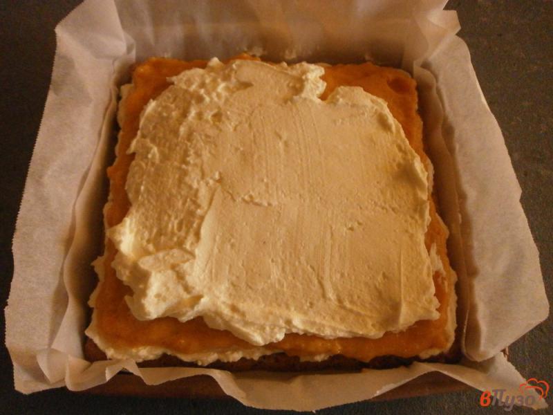 Фото приготовление рецепта: Бисквитно - ореховый торт с тыквенным и сливочным кремом шаг №15