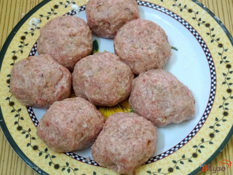 Фото приготовление рецепта: Мясные шарики со сливочным соусом шаг №8