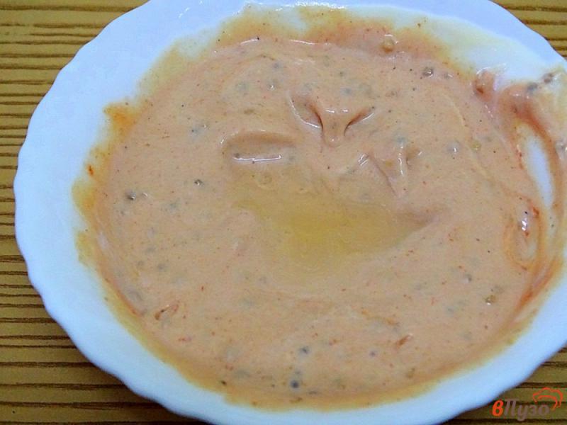 Фото приготовление рецепта: Сельдь под соусом с кетчупом шаг №8