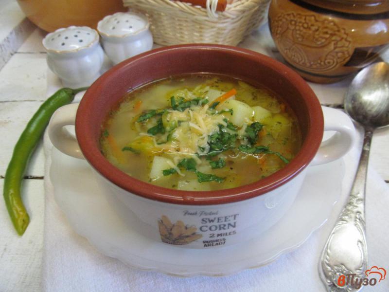 Фото приготовление рецепта: Рисовый суп с солеными огурцами шаг №7