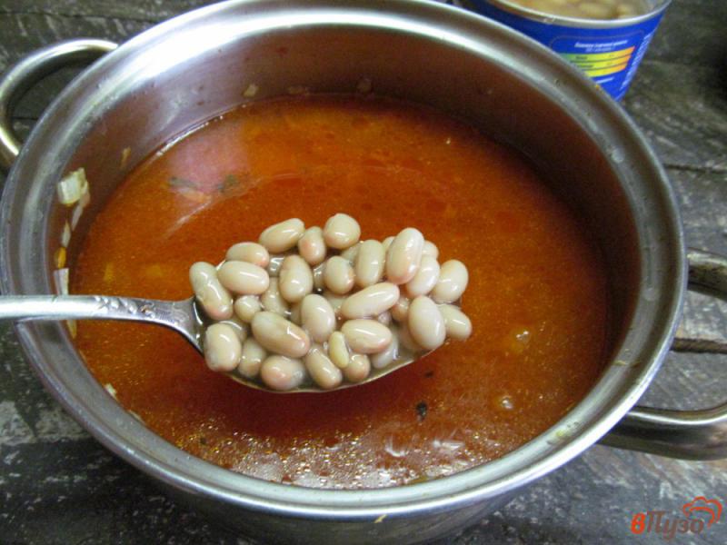 Фото приготовление рецепта: Томатный суп с копчеными колбасками шаг №4
