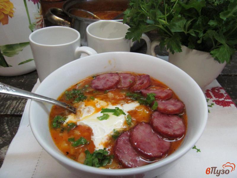 Фото приготовление рецепта: Томатный суп с копчеными колбасками шаг №8