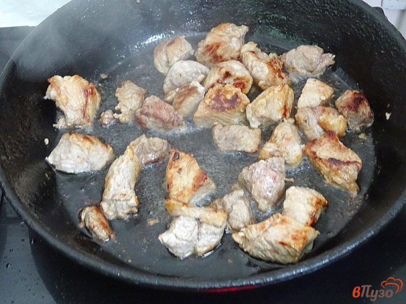 Фото приготовление рецепта: Свинина тушёная в пиве шаг №5