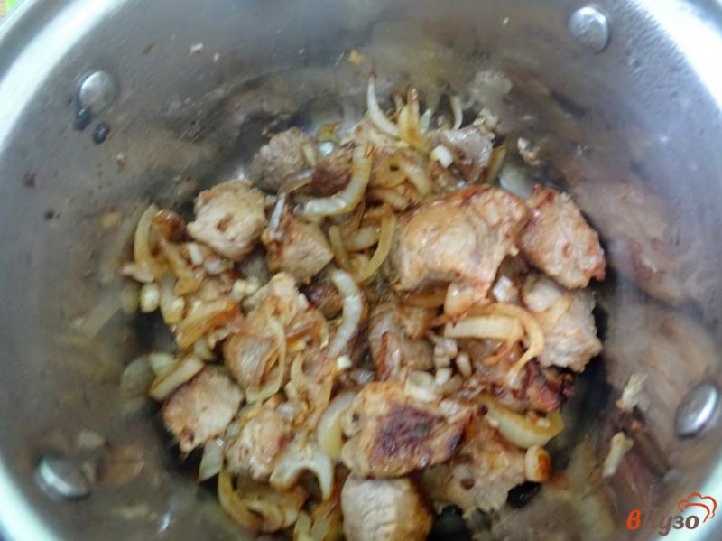 Фото приготовление рецепта: Свинина тушёная в пиве шаг №6