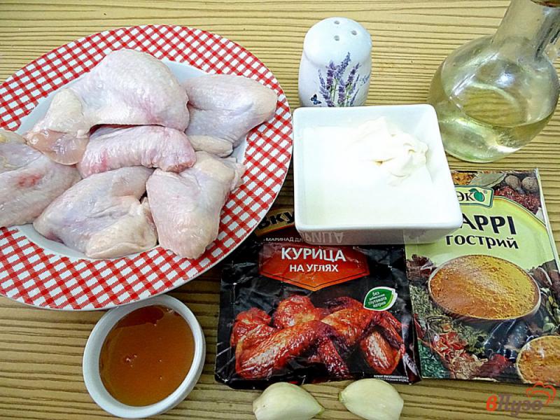 Фото приготовление рецепта: Куриные крылья в сметанном соусе с карри шаг №1