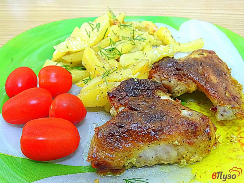 Фото приготовление рецепта: Куриные крылья в сметанном соусе с карри шаг №9