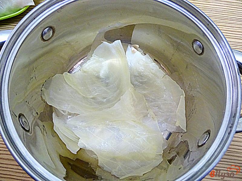 Фото приготовление рецепта: Голубцы со свининой из замороженной капустой шаг №9