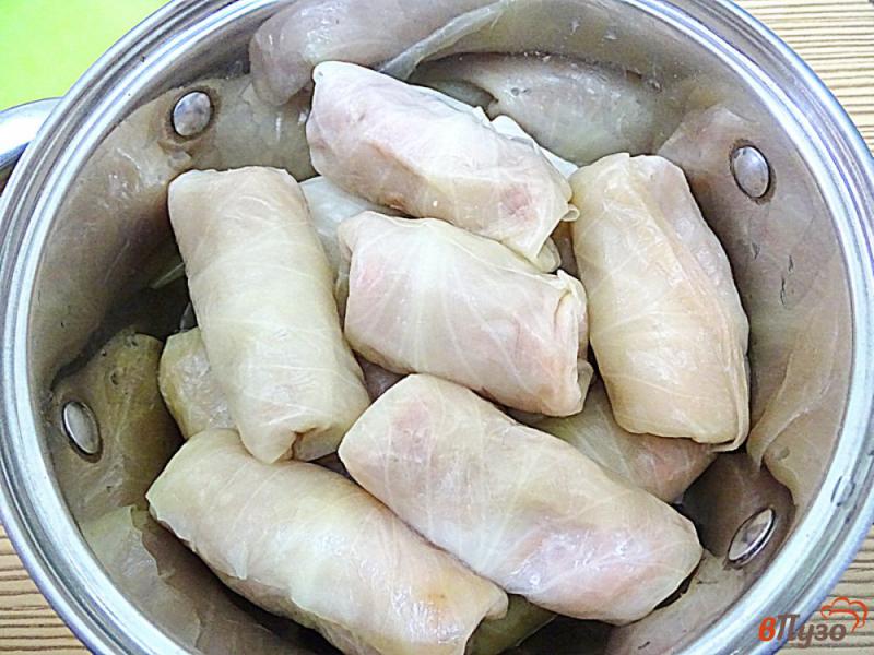 Фото приготовление рецепта: Голубцы со свининой из замороженной капустой шаг №10