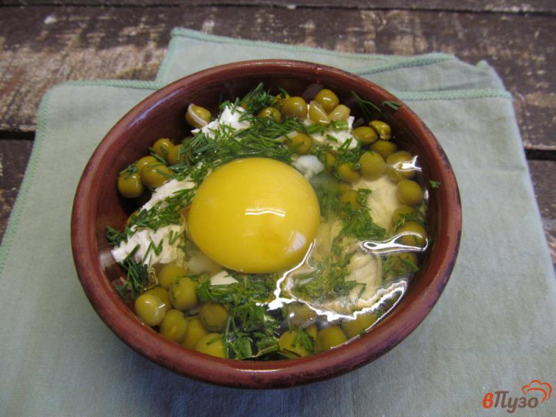Фото приготовление рецепта: Запеченные яйца - кокот с ветчиной шаг №5