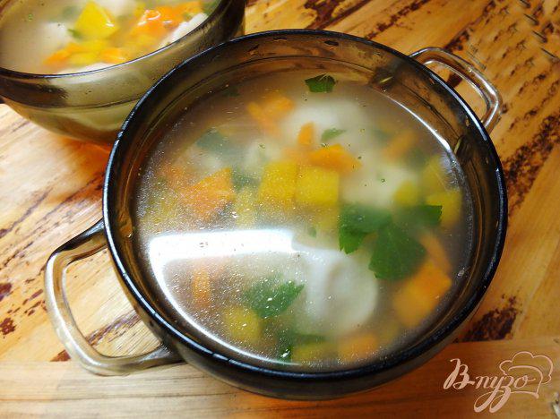 фото рецепта: Суп с тыквой и пельменями