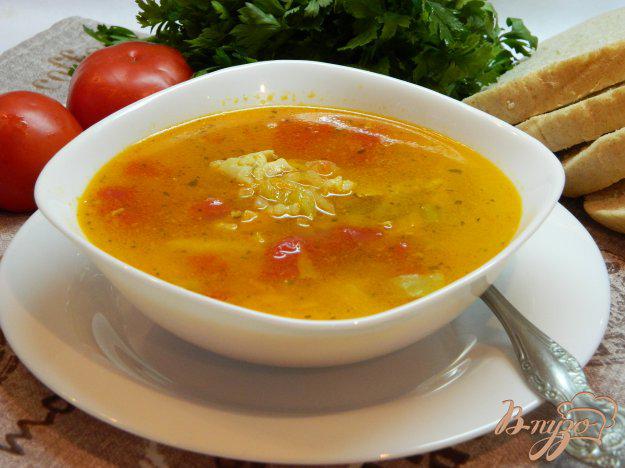 фото рецепта: Рисовый суп с помидорами