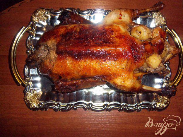 фото рецепта: Запеченная утка с картофелем и луком в рукаве