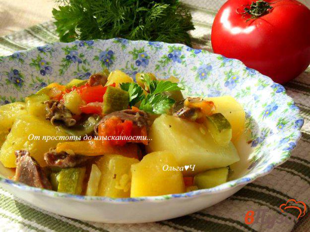 фото рецепта: Куриные сердечки с овощами по-гречески (в мультиварке)