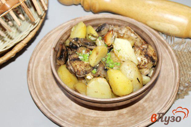 фото рецепта: Куриные крылья с грибами и картофелем в рукаве