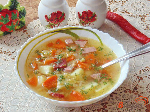 фото рецепта: Суп с красной чечевицей и копченой колбасой