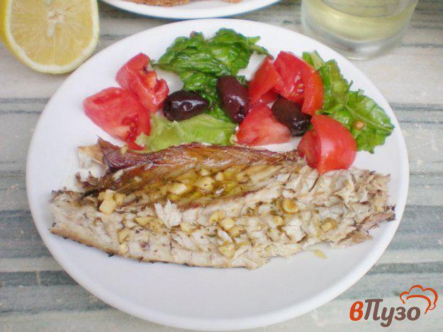 фото рецепта: Рыба сарпа под чесночно-лимонным соусом