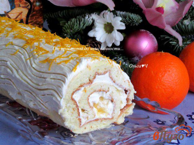 фото рецепта: Бисквитный рулет с творожным сыром и апельсином